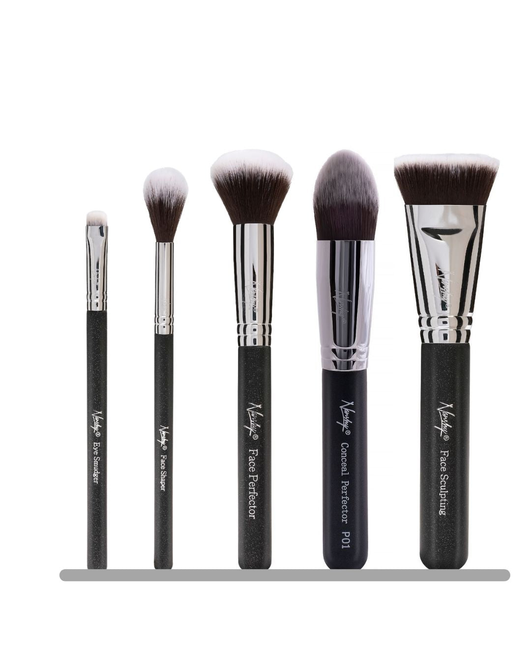 Set of five makeup brushes with black handles and white bristles, including Eye Smudger, Face Shaper, Face Perfector, Conceal Perfector, and Face Sculpting brushes.