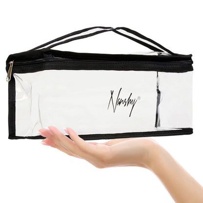 Clear makeup bag with a black trim, featuring a wide rectangular design being held in one hand.