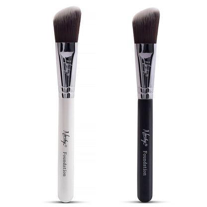 Two Nanshy Flat Foundation Brushes with angled bristles, one with a white wooden handle and the other with a black wooden handle, both featuring a sleek metal ferrule and engraved Nanshy logo.