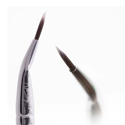 Close-up of Precise Bent Eyeliner Brush with elegant pearl-coated handle and soft synthetic bristles, perfect for applying gel, liquid, or powder eyeliner with precision.