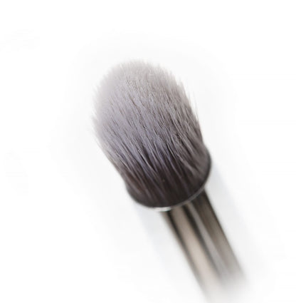 Close-up of the Tapered Crease eyeshadow brush with soft, antibacterial synthetic bristles and a sleek, pearl-coated handle.