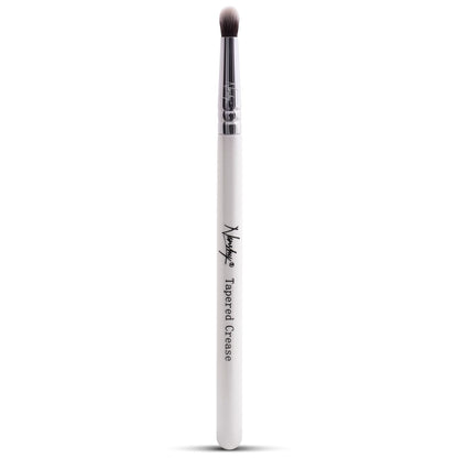 Nanshy Tapered Crease Eyeshadow Brush with white pearl-coated handle and antibacterial synthetic bristles.